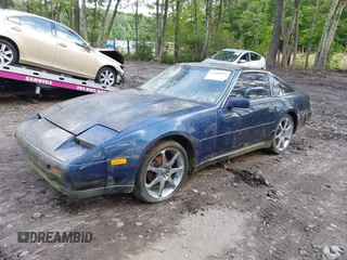 1989 Nissan 300ZX z VIN JN1HZ14S7KX290051, wystawiony jako IAAI lot #42203078 z przebiegiem 136 643 mil mil oraz . Historia ofert i sprzedaży dostępna na DreamBid. Obrazek 2.
