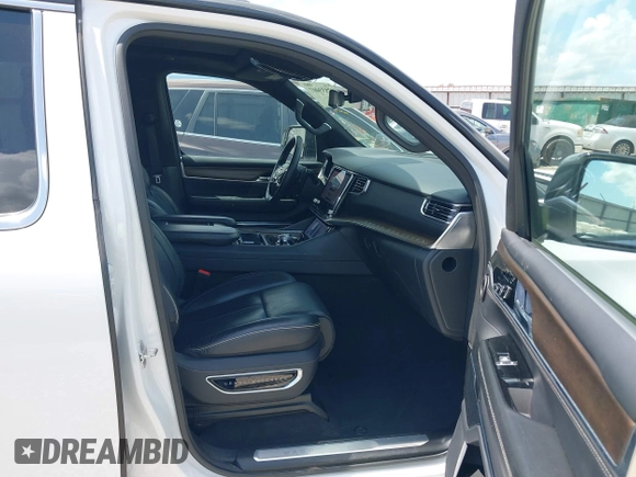 2023 Jeep Grand Wagoneer Series II with VIN 1C4SJSFP7PS530079, listed as a IAAI auction lot 42533407 with 51,178 mi miles and . Bid and sale history available at DreamBid. Image 5.