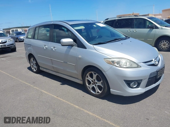 2009 Mazda 5 Sport with VIN JM1CR293990334438, listed as a IAAI auction lot 42561953 with 118,178 mi miles and . Bid and sale history available at DreamBid. Image 1.