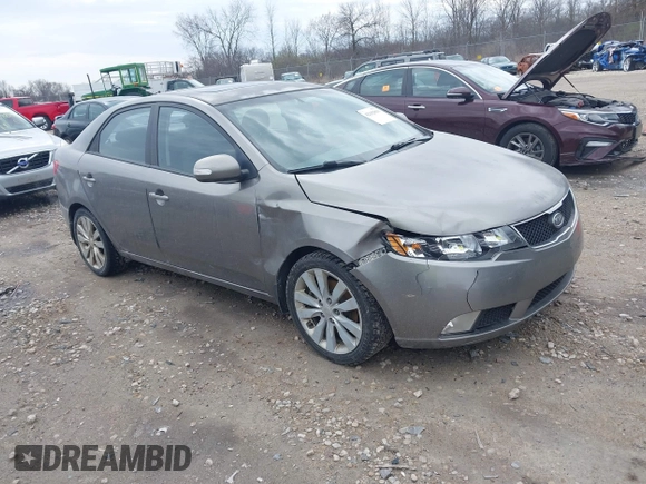 2010 Kia Forte SX with VIN KNAFW4A31A5048066, listed as a IAAI auction lot 42102810 with 160,998 mi miles. Bid and sale history available at carsss.com. Image 1.