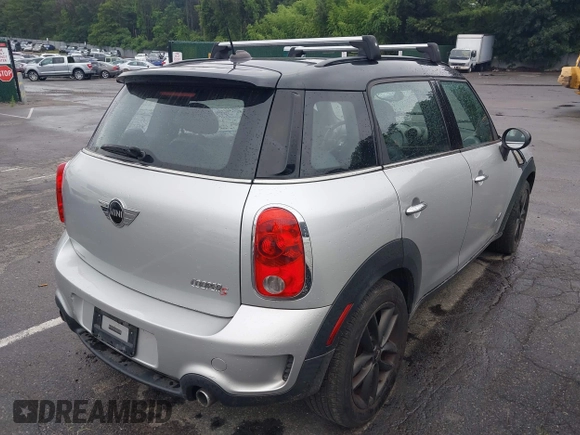 2012 MINI Countryman S with VIN WMWZC5C5XCWL55727, listed as a IAAI auction lot 42704959 with 104,000 mi miles and . Bid and sale history available at DreamBid. Image 4.