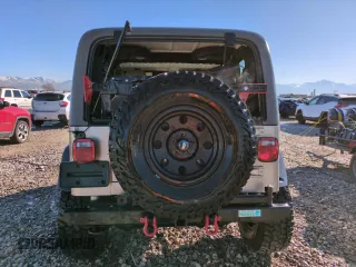 2004 Jeep Wrangler Rubicon with VIN 1J4FA69S14P749749, listed as a Copart auction lot 44458485 with 99,121 mi miles and Salvage Title. Bid and sale history available at carsss.com. Image 6.