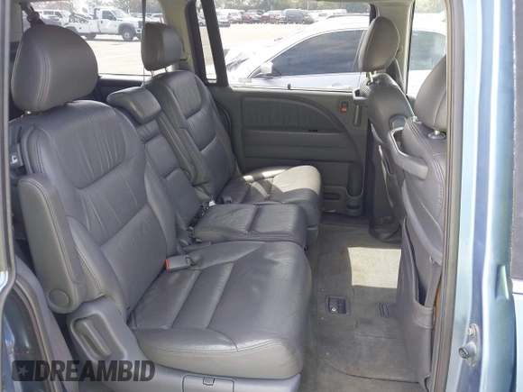 2006 Honda Odyssey EX-L z VIN 5FNRL38706B075356, wystawiony jako IAAI lot #42021960 z przebiegiem 120 455 mil mil oraz . Historia ofert i sprzedaży dostępna na DreamBid. Obrazek 8.