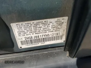 2000 Honda Civic VP z VIN 2HGEJ6617YH512191, wystawiony jako Copart lot #57139055 z przebiegiem 180 038 mil mil oraz Szkoda całkowita • Salvage title. Historia ofert i sprzedaży dostępna na DreamBid. Obrazek 13.