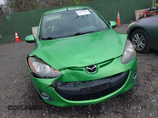 2011 Mazda 2 Sport with VIN JM1DE1HZ1B0119805, listed as a IAAI auction lot 41934481 with 122,679 mi miles. Bid and sale history available at carsss.com. Image 6.