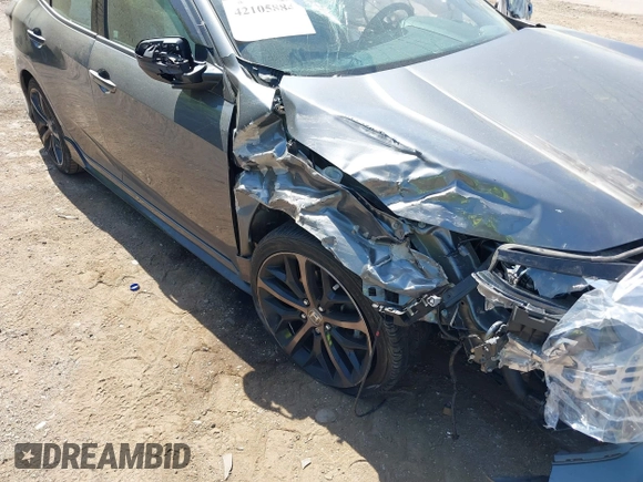 2021 Honda Civic Sport with VIN SHHFK7H49MU412153, listed as a IAAI auction lot 42105884 with 44,000 mi miles and . Bid and sale history available at DreamBid. Image 6.