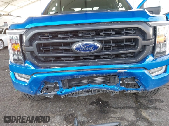 2021 Ford F-150 XL with VIN 1FTFW1CD0MFC50953, listed as a IAAI auction lot 41466036 with 33,983 mi miles and . Bid and sale history available at DreamBid. Image 6.