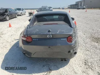 2023 Mazda MX-5 Miata Grand Touring z VIN JM1NDAM70P0550719, wystawiony jako Copart lot #75485484 z przebiegiem 21 110 mil mil oraz Szkoda całkowita • Salvage title. Historia ofert i sprzedaży dostępna na DreamBid. Obrazek 6.