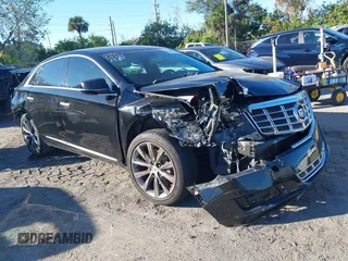 2014 Cadillac XTS with VIN 2G61L5S34E9261034, listed as a IAAI auction lot 41250779 with 178,218 mi miles. Bid and sale history available at carsss.com. Image 1.