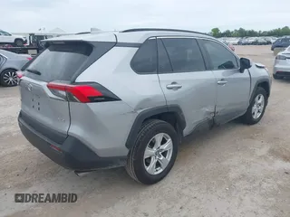 2020 Toyota RAV4 XLE with VIN 2T3W1RFV4LW094687, listed as a IAAI auction lot 42652039 with 56,693 mi miles and . Bid and sale history available at DreamBid. Image 4.