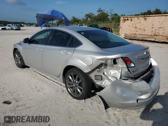 2009 Mazda 6 with VIN 1YVHP80A895M26311, listed as a Copart auction lot 63041255 with 103,156 mi miles and Salvage title. Bid and sale history available at DreamBid. Image 2.