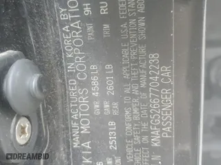 2007 Kia Rondo EX with VIN KNAFG526677042238, listed as a Copart auction lot 70869634 with 152,464 mi miles and Salvage Title. Bid and sale history available at carsss.com. Image 13.