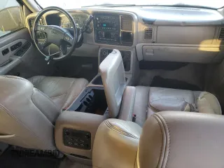 2003 GMC Yukon SLT with VIN 1GKEK13Z43R219290, listed as a Copart auction lot 69303144 with 299,023 mi miles and Salvage Title. Bid and sale history available at carsss.com. Image 8.