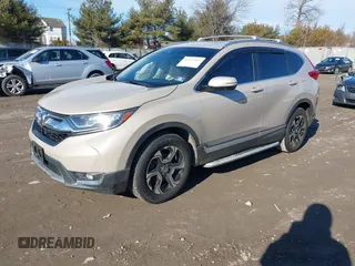 2017 Honda CR-V Touring with VIN 5J6RW2H94HL013536, listed as a IAAI auction lot 41577317 with 97,132 mi miles. Bid and sale history available at carsss.com. Image 18.