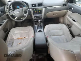 2010 Ford Fusion Hybrid с VIN 3FADP0L38AR185666, выставлен на аукционе Copart как лот 60418745 с пробегом 183 866 миль миль и Чистый • Clean title. История ставок и продаж доступна на DreamBid. Изображение 8.