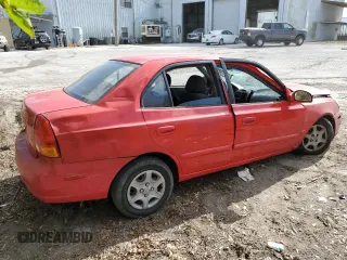 2005 Hyundai Accent GLS with VIN KMHCG45CX5U618473, listed as a Copart auction lot 76752994 with 0 mi miles and Salvage Title. Bid and sale history available at carsss.com. Image 3.