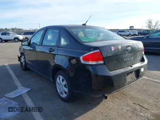 2011 Ford Focus S with VIN 1FAHP3EN4BW123861, listed as a IAAI auction lot 41464719 with 123,900 mi miles and . Bid and sale history available at carsss.com. Image 3.