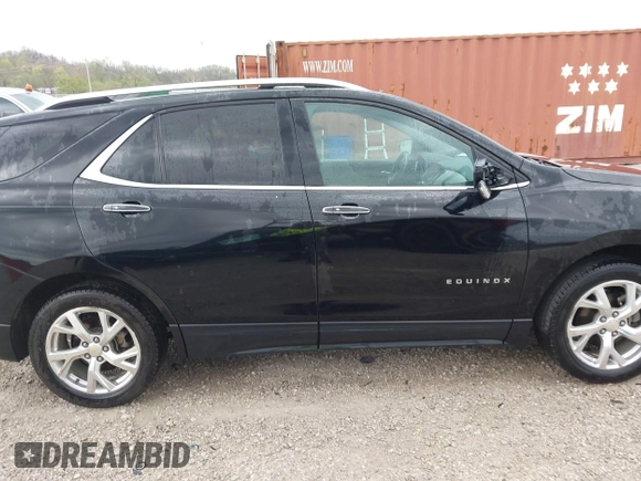 2018 Chevrolet Equinox Premier with VIN 2GNAXVEV7J6275379, listed as a IAAI auction lot 41949962 with 149,329 mi miles and . Bid and sale history available at DreamBid. Image 13.