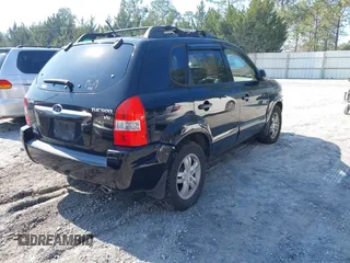 2006 Hyundai Tucson GLS with VIN KM8JN12D16U418088, listed as a IAAI auction lot 41478091 with 157,403 mi miles. Bid and sale history available at carsss.com. Image 4.