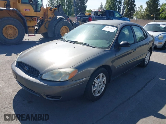 2005 Ford Taurus SE with VIN 1FAFP53U95A289971, listed as a IAAI auction lot 42143134 with 167,702 mi miles. Bid and sale history available at carsss.com. Image 6.