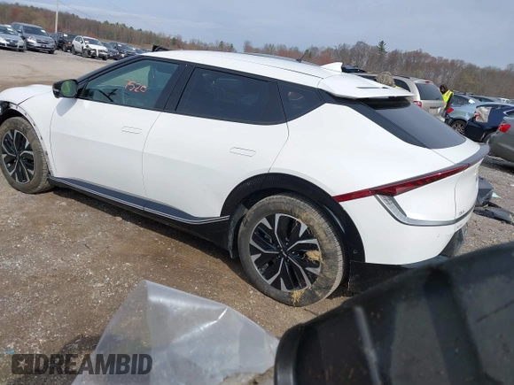 2022 Kia EV6 Wind z VIN KNDC3DLC5N5039405, wystawiony jako IAAI lot #41937250 z przebiegiem 55 659 mil mil oraz . Historia ofert i sprzedaży dostępna na DreamBid. Obrazek 3.