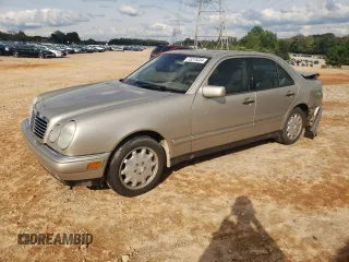 1999 Mercedes-Benz E-Class with VIN WDBJF65HXXA891437, listed as a Copart auction lot 73278334 with 197,159 mi miles and Salvage Title. Bid and sale history available at carsss.com. Image 1.