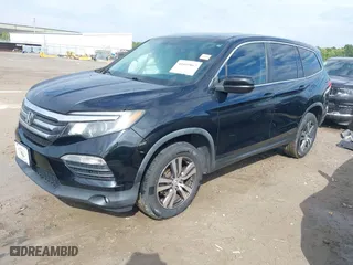 2016 Honda Pilot EX-L with VIN 5FNYF6H5XGB031594, listed as a IAAI auction lot 40409867 with 132,227 mi miles. Bid and sale history available at carsss.com. Image 2.