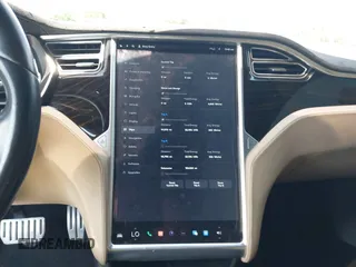 2016 Tesla Model S 90D with VIN 5YJSA1E48GF144821, listed as a IAAI auction lot 42206473 with 129,624 mi miles and . Bid and sale history available at DreamBid. Image 18.