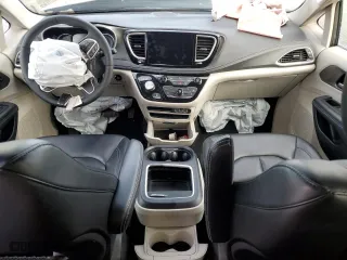 2023 Chrysler Pacifica Hybrid Touring L with VIN 2C4RC1L72PR551270, listed as a Copart auction lot 47172465 with 48,605 mi miles and Non Repairable. Bid and sale history available at carsss.com. Image 8.