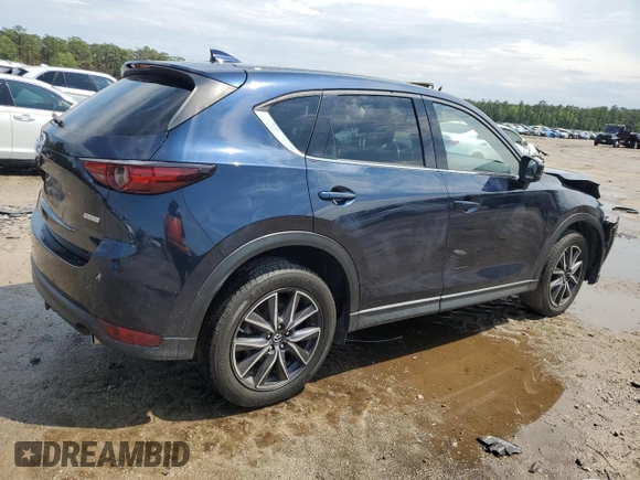 2018 Mazda CX-5 Grand Touring with VIN JM3KFADM3J1312519, listed as a Copart auction lot 56276685 with 109,486 mi miles and Clean title. Bid and sale history available at DreamBid. Image 3.
