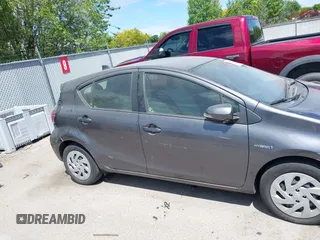 2016 Toyota Prius One z VIN JTDKDTB37G1134269, wystawiony jako IAAI lot #42040779 z przebiegiem 38 443 mil mil oraz . Historia ofert i sprzedaży dostępna na DreamBid. Obrazek 6.