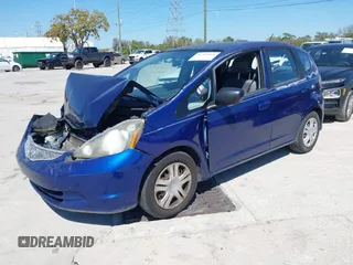 2009 Honda Fit with VIN JHMGE88249S056575, listed as a IAAI auction lot 41702555 with 116,658 mi miles. Bid and sale history available at carsss.com. Image 17.
