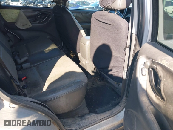2004 Ford Escape XLT with VIN 1FMYU03114KA64517, listed as a IAAI auction lot 38651835 with 335,194 mi miles and . Bid and sale history available at DreamBid. Image 8.