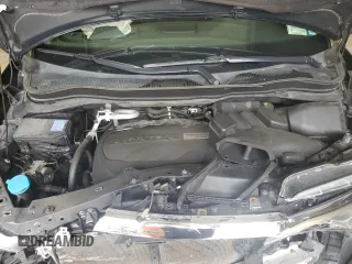 2017 Honda Pilot Touring z VIN 5FNYF6H91HB011030, wystawiony jako Copart lot #60236875 z przebiegiem 119 909 mil mil oraz Szkoda całkowita • Salvage title. Historia ofert i sprzedaży dostępna na DreamBid. Obrazek 12.