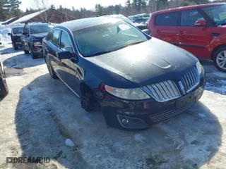 2009 Lincoln MKS with VIN 1LNHM94R99G621385, listed as a IAAI auction lot 41629527 with 124,086 mi miles. Bid and sale history available at carsss.com. Image 1.
