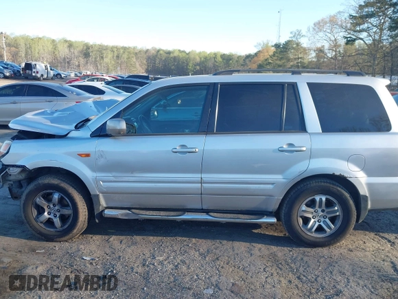 2006 Honda Pilot EX-L with VIN 2HKYF18776H553104, listed as a IAAI auction lot 41878219 with 265,894 mi miles and . Bid and sale history available at DreamBid. Image 13.