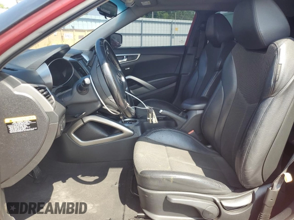 2015 Hyundai Veloster with VIN KMHTC6AD0FU238274, listed as a Copart auction lot 65181205 with 143,112 mi miles and Clean title. Bid and sale history available at DreamBid. Image 7.