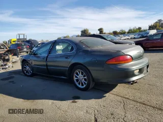 2001 Chrysler LHS z VIN 2C3AC56G31H606648, wystawiony jako Copart lot #77123814 z przebiegiem 83 574 mil mil oraz Tytuł czysty. Historia ofert i sprzedaży dostępna na DreamBid. Obrazek 2.