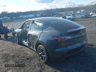 2024 Tesla Model Y Long Range with VIN 7SAYGAEEXRF212415, listed as a IAAI auction lot 41665627 with Not Provided miles and . Bid and sale history available at DreamBid. Image 3.