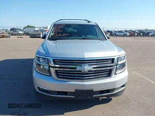 2015 Chevrolet Tahoe LTZ with VIN 1GNSKCKC5FR205739, listed as a IAAI auction lot 40020644 with 142,524 mi miles and . Bid and sale history available at DreamBid. Image 12.