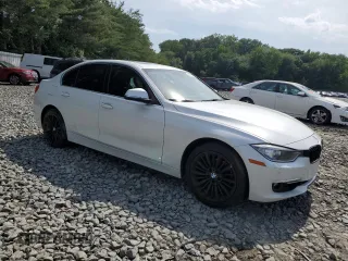 2015 BMW 3 Series 328i xDrive with VIN WBA3B3G52FNT19323, listed as a Copart auction lot 61873015 with 110,893 mi miles and Salvage title. Bid and sale history available at DreamBid. Image 4.