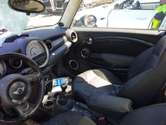 2011 MINI Hardtop S with VIN WMWSV3C57BTY24448, listed as a IAAI auction lot 42078399 with 166,033 mi miles and . Bid and sale history available at DreamBid. Image 5.