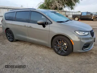 2023 Chrysler Pacifica Touring L with VIN 2C4RC1BG4PR505313, listed as a Copart auction lot 54069305 with 24,687 mi miles and Salvage title. Bid and sale history available at DreamBid. Image 4.