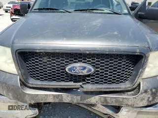 2004 Ford F-150 XLT with VIN 1FTPX14514NB53551, listed as a Copart auction lot 59434295 with 179,798 mi miles and Salvage title. Bid and sale history available at DreamBid. Image 11.