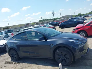2024 Tesla Model Y with VIN 7SAYGDED9RA321373, listed as a IAAI auction lot 42228491 with 6,452 mi miles and . Bid and sale history available at DreamBid. Image 12.