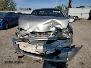 1999 Mazda 626 ES with VIN 1YVGF22C4X5887335, listed as a Copart auction lot 51726654 with 147,359 mi miles and Salvage Title. Bid and sale history available at carsss.com. Image 5.