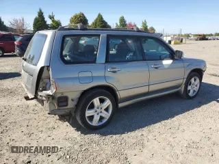 2007 Subaru Forester Sports XT with VIN JF1SG69677H709010, listed as a Copart auction lot 72143004 with 153,460 mi miles and Salvage Title. Bid and sale history available at carsss.com. Image 3.