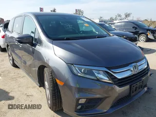 2019 Honda Odyssey EX z VIN 5FNRL6H51KB127099, wystawiony jako IAAI lot #41581863 z przebiegiem 91 501 mil mil oraz . Historia ofert i sprzedaży dostępna na DreamBid. Obrazek 1.