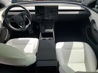 2025 Tesla Model 3 Long Range with VIN 5YJ3E1EA8SF984931, listed as a Copart auction lot 61259345 with 2,248 mi miles and Salvage title. Bid and sale history available at DreamBid. Image 8.