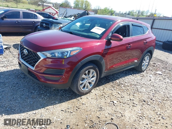 2019 Hyundai Tucson SE with VIN KM8J2CA41KU926156, listed as a IAAI auction lot 41888461 with 91,094 mi miles. Bid and sale history available at carsss.com. Image 2.